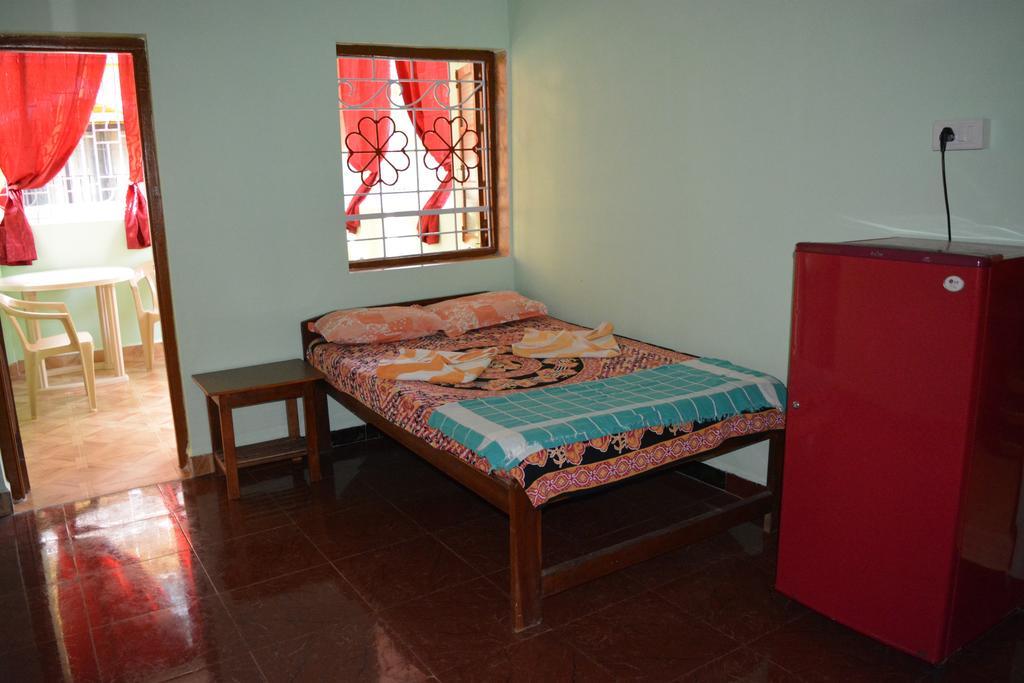 Vailankanni Guesthouse Morjim Bilik gambar